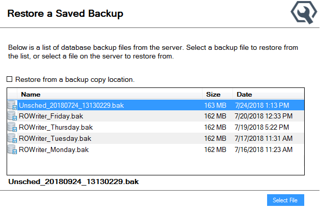 The Restore window with saved backup files in the table.